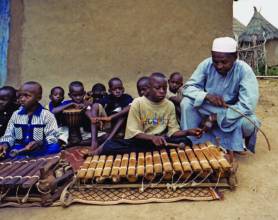 A sacred symbol of freedom and identity of the Manding community, the Sosso-bala is a wooden xylophone or balafon played on occasions such as the Muslim New Year and burials. The master players, holding an important position in Manding society, teach children as young as seven.