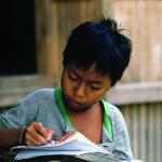 Schoolboy, Maninjau Lake, Sumatra, Indonesia. Credit: [BODY Philippe / EFA Report]