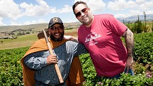 Chef Mike Isabella of Washington DC, right, stands with potato farmer and CARE program participant, Edilberto Soto Tenoria, during a food and nutrition focused tour with CARE on January 28 in Condorccocha, a town in the Ayacucho region of Peru. Chefs on t