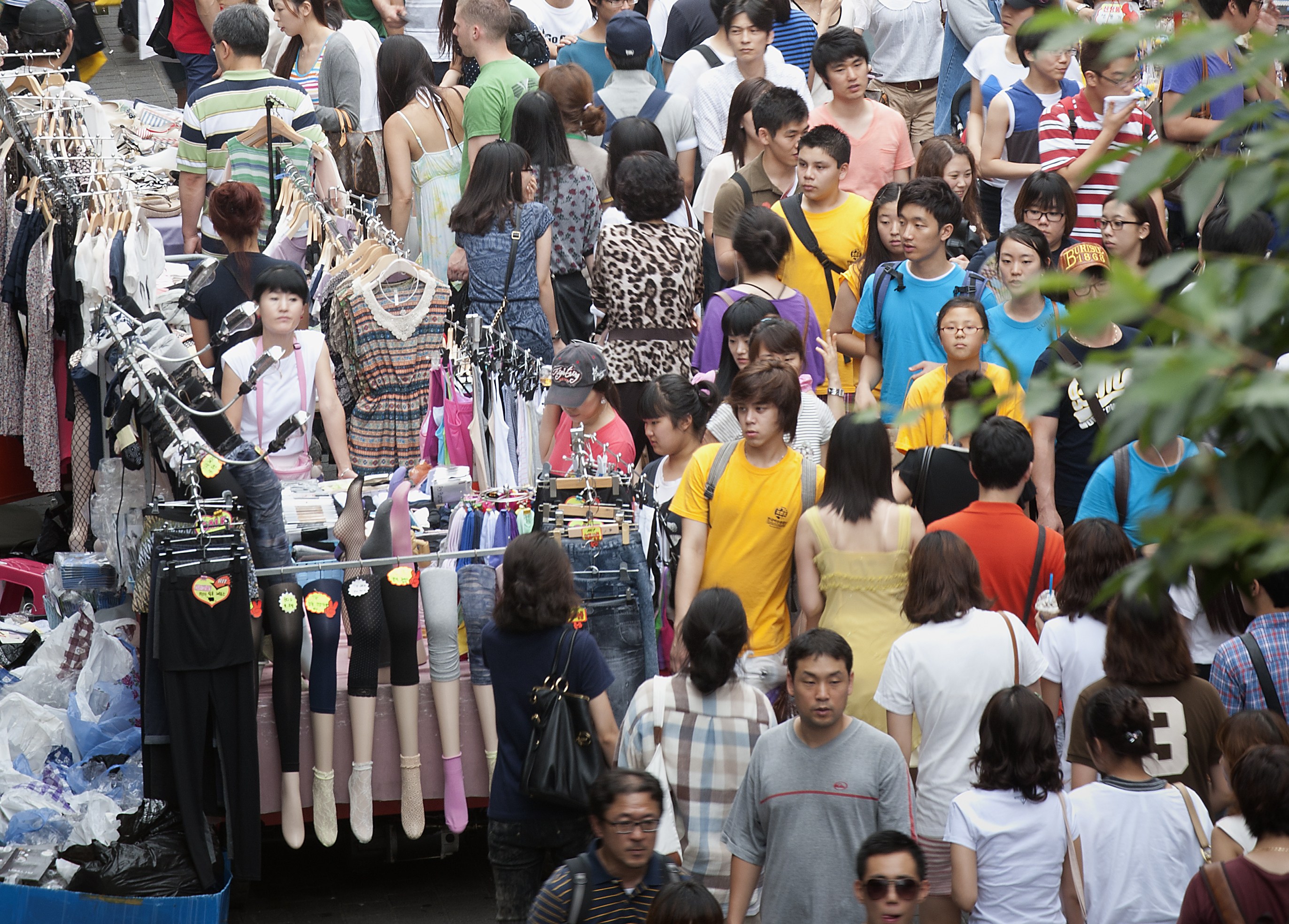Photo: A throng of shoppers in Myungdong, downtown Seoul.