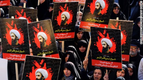 Iranian women gather during a demonstration against the execution of prominent Shiite Muslim cleric Nimr al-Nimr (portrait) by Saudi authorities, at Imam Hossein Square in the capital Tehran on January 4, 2016. Tensions between Iran and its Sunni Arab neighbours reached new heights as Saudi Arabia and Gulf allies cut or downgraded diplomatic ties with Tehran in a row over the execution of a Shiite cleric. AFP PHOTO / ATTA KENARE / AFP / ATTA KENARE        (Photo credit should read ATTA KENARE/AFP/Getty Images)