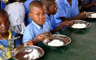 School children eat in the World Central Kitchen canteen in Palmiste Tampe, Haiti. Photo: World Central Kitchen