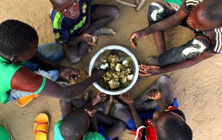 During the lean season, families in Wurotorobe, Burkina Faso, struggle to have at least one meal per day, but often they only calm the worst hunger. The poor diet makes small children extremely vulnerable to epidemics and disease. Photo: OCHA/Ivo Brandau