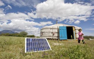 Photo: A family in Tarialan, Uvs Province, Mongolia, uses a solar panel to generate power for their ger, a traditional Mongolian tent. UN Photo/Eskinder Debebe.