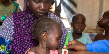 A nutrition screening for children in the Dalori camp for internally displaced people, in the north-eastern city of Maiduguri in Borno State. Photo: UNICEF/ Esiebo
