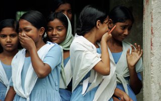 Photo: Students laugh as they leave school in Bangladesh. Photo: Scott Wallace/World Bank