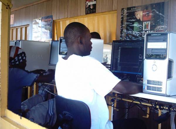 Young man using a computer in the 14-computer laboratory