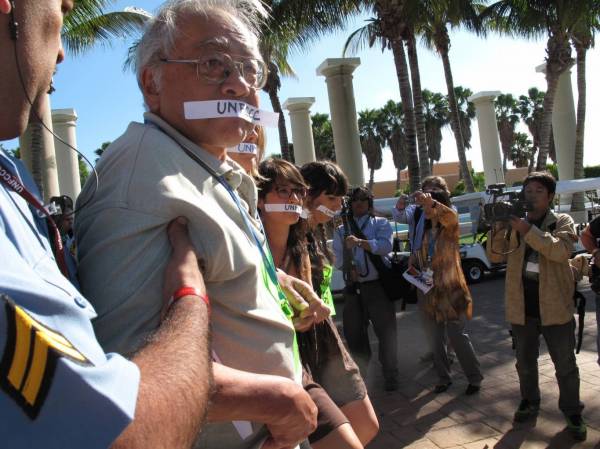 COP16 Climate Change at Cancun - Police and Protestors