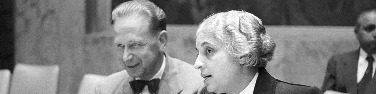 The eighth session of the United Nations General Assembly elected Madam Vijaya Lakshmi Pandit, of India, as its President. Madam Pandit is photographed here with U.N. Secretary - General Dag Hammarskjöld.