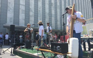 Photo: Bash the Trash, a band that builds its own instruments out of garbage, performs in the UN Visitors' Plaza.