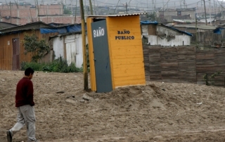 Public toilet in the shanty town of Ciudad Pachacutec, Ventanilla District, El Callao Province, Peru. Photo: World Bank/Monica Tijero