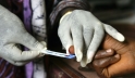 A woman has her blood taken for a test at a clinic in Freetown, Sierra Leone. Photo: Panos/ Giacomo Pirozzi