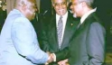 Focus on human rights: Mr. Annan with President Kabila (far left) and OAU Secretary-General Salim Salim