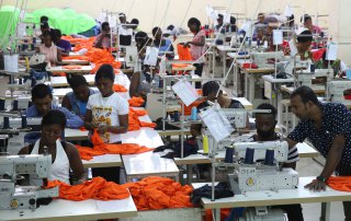 Photo: Factory workers in Accra, Ghana, produce shirts for overseas clients.