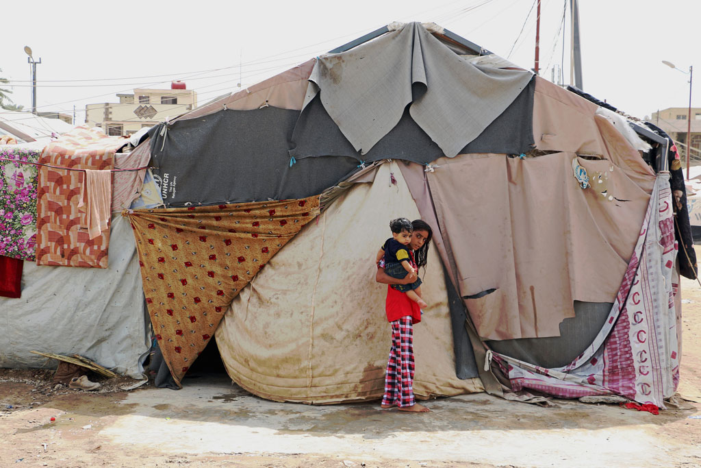 أسرة لاجئة في بغداد، العراق. سبتمبر 2015. المصدر: / محمد بهبهاني