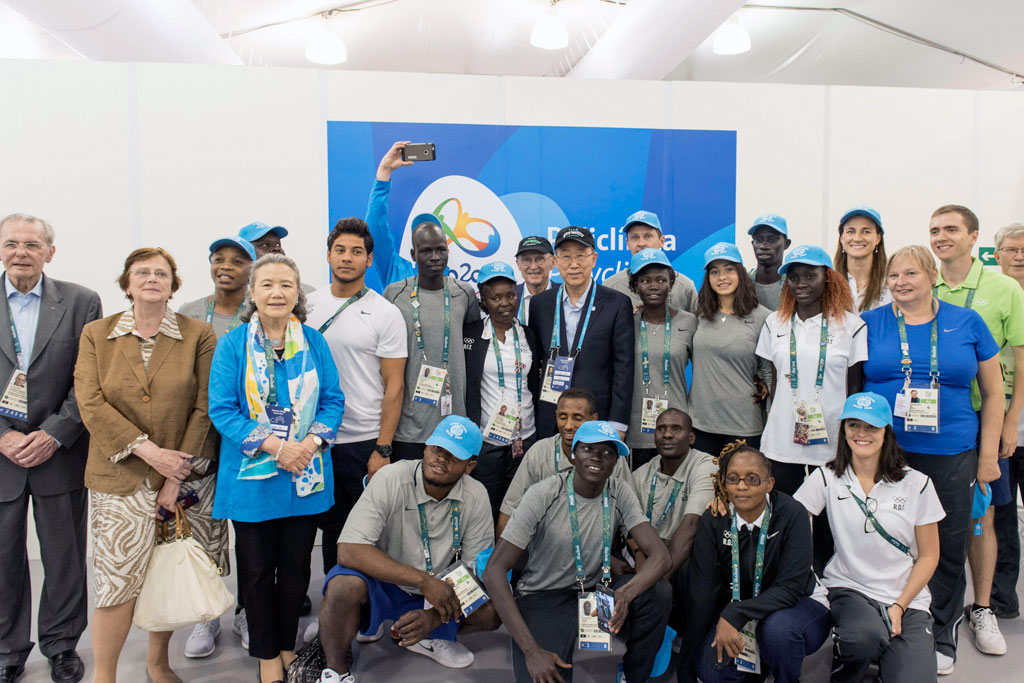 Secretary-General Ban Ki-moon (centre) meets with the Olympic Refugee Team at the Olympic Village in Rio de Janeiro, Brazil. UN Photo/Mark Garten