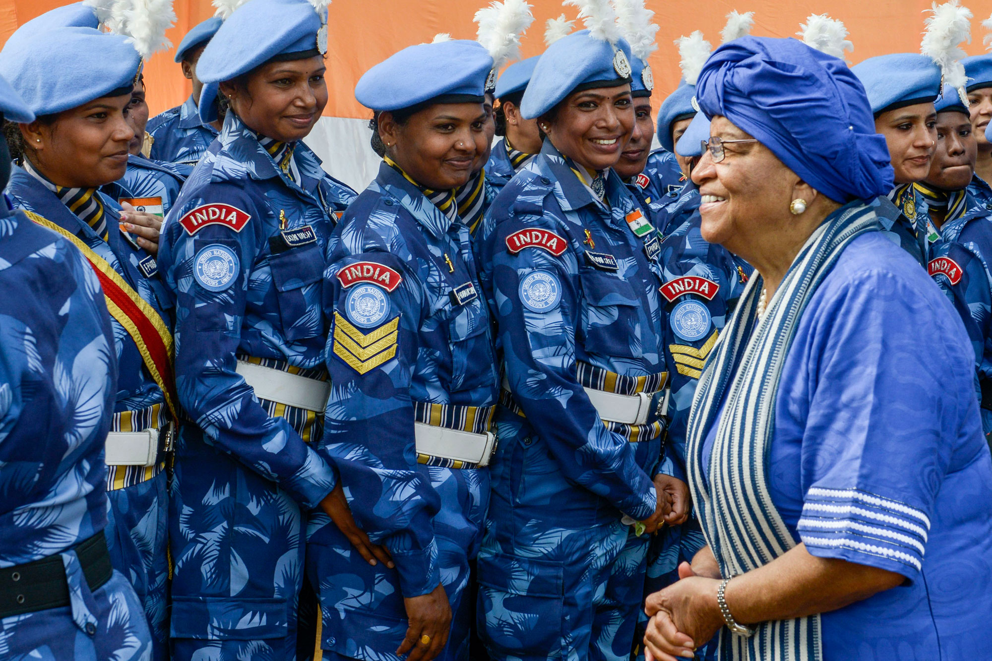 President Ellen Johnson-Sirleaf (left) with members of the all-female Indian Formed Police Unit serving with the UN Mission in Liberia in February 2016. Photo: Emmanuel Tobey/UNMIL