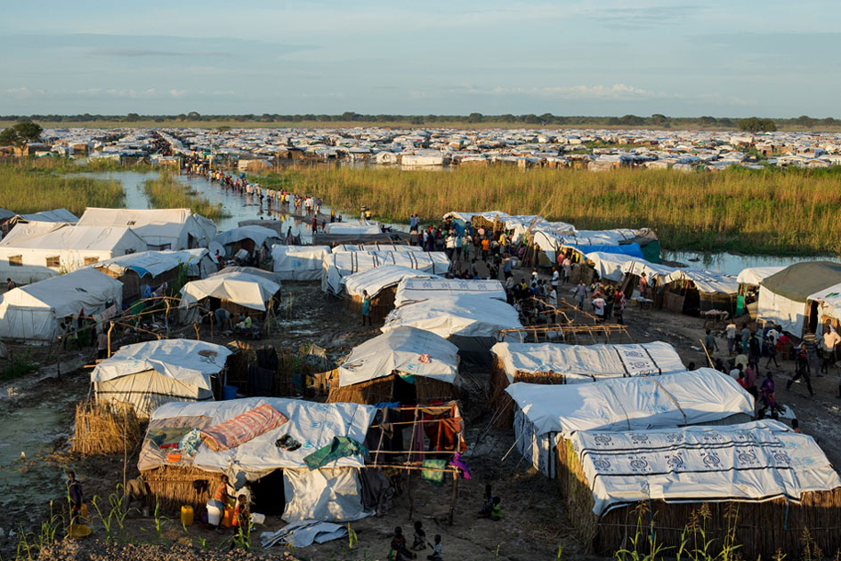 The Protection of Civilians (PoC) site near Bentiu, South Sudan, houses thousands of displaced persons (IDPs) seeking shelter from armed conflict in the area. (file) UN Photo/JC McIlwaine
