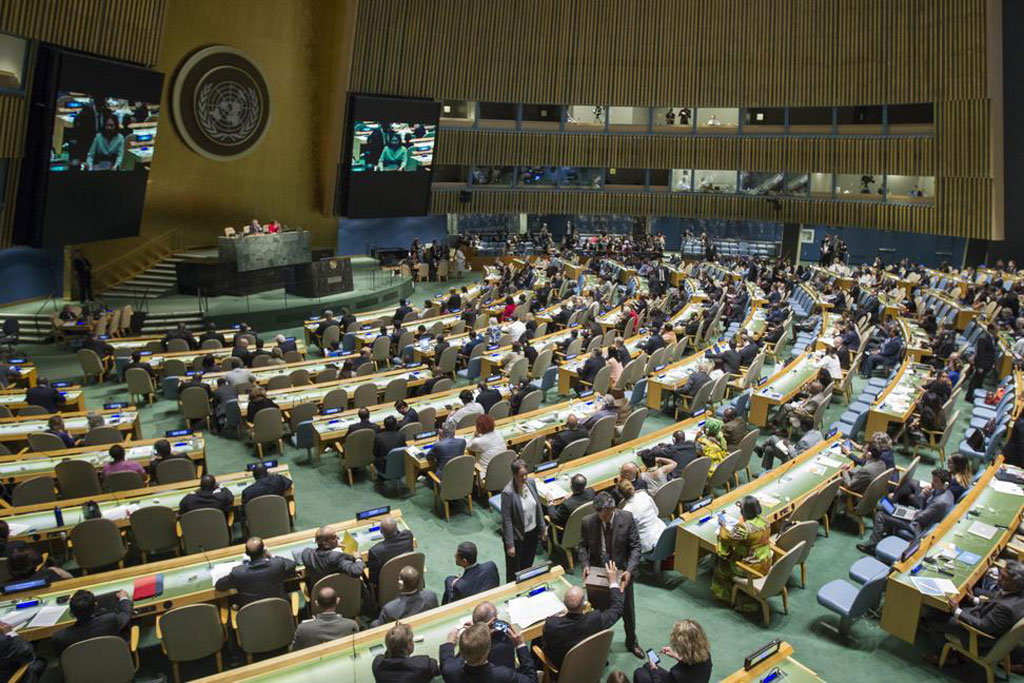Wide view of the General Assembly Hall while ballots are being collected for the election of new non-permanent members of the Security Council for two-year terms starting on 1 January 2017. UN Photo/Manuel Elias