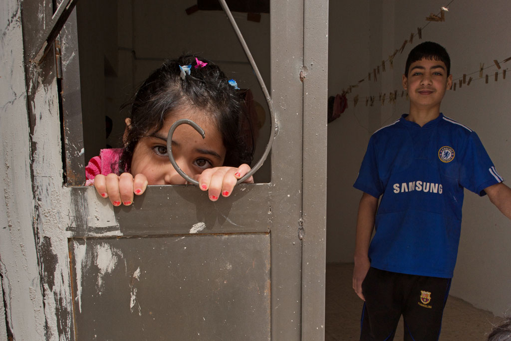 Two Syrian refugees, a brother and sister, in Jordan. Photo: UNICEF/Lucy Lyon