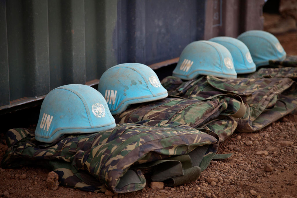 Blue helmets and uniforms of UN Peacekeepers.  UN Photo/Marco Dormino