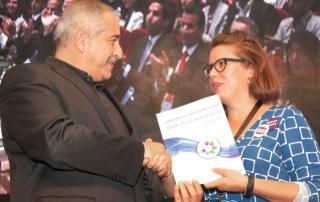 Deputy Prime Minister and Foreign Minister Nasser Judeh receives the Amman Youth Declaration’s final draft from Matilda Flemming at the conclusion of the Global Forum on Youth, Peace and Security in Madaba on Saturday (Photo by Osama Aqarbeh)