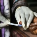 A woman has her blood taken for a test at a clinic in Freetown, Sierra Leone. Photo: Panos/ Giacomo Pirozzi