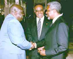 Focus on human rights: Mr. Annan with President Kabila (far left) and OAU Secretary-General Salim Salim