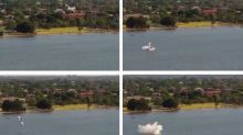Thousands watch as plane plunges into Australian river