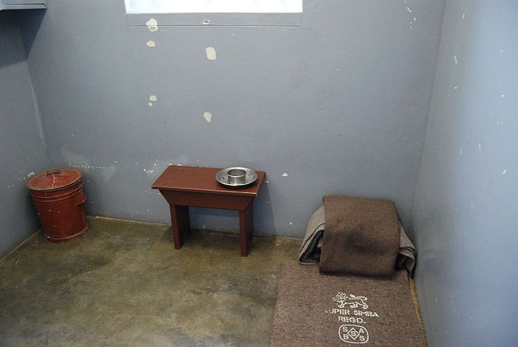 Nelson Mandela's prison cell on Robben Island, a UNESCO World Heritage Site since 1999. Robben Island was used at various times between the 17th and 20th centuries as a prison, a hospital for socially unacceptable groups and a military base. Its buildings, particularly those of the late 20th century such as the maximum security prison for political prisoners, witness the triumph of democracy and freedom over oppression and racism.
