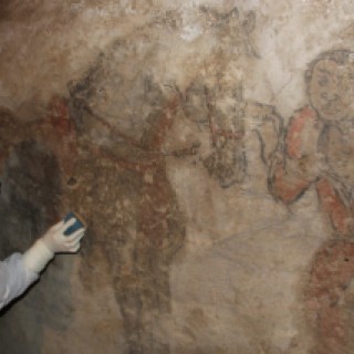 Trainee working on the cleaning of one section of the painting ©Center of Cultural Heritage of Mongolia