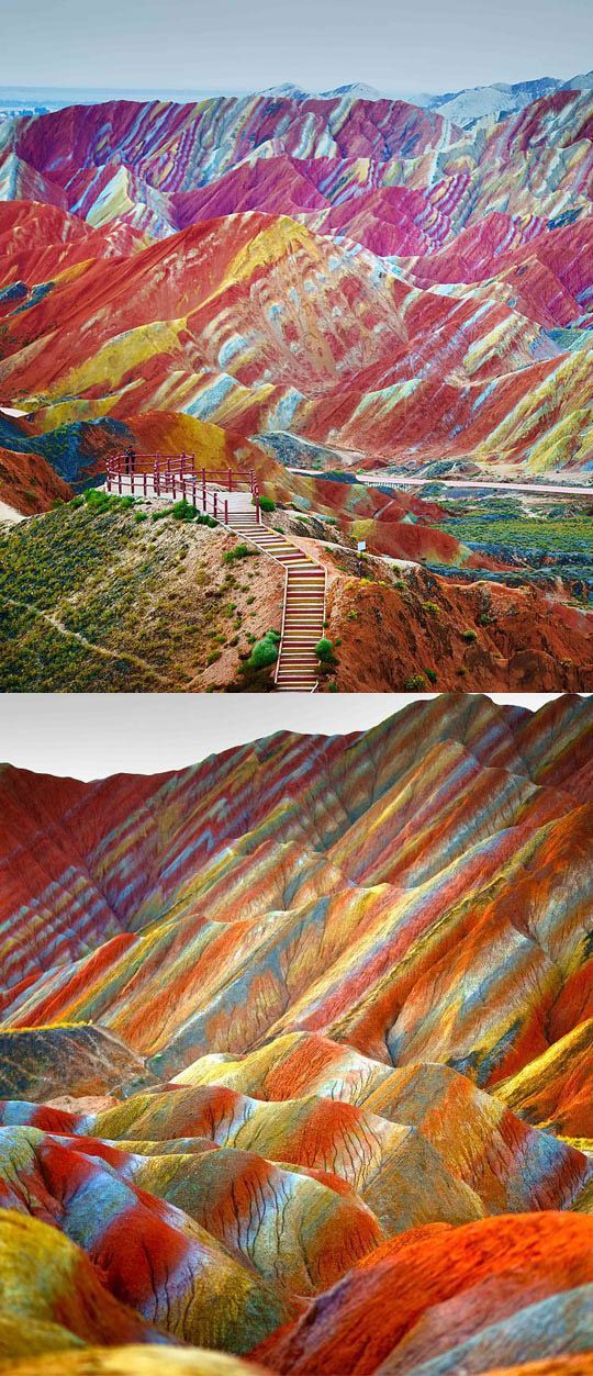 Danxia Landform Geological Park in Gansu, China. The rainbow mountains became a UNESCO World Heritage Site in 2010.  The colors are the result of mineral deposits and red sandstone.