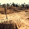 Preparation of construction bricks, African village