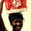 Everyday life, water gathering, woman carrying water, bucket