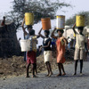 Everyday life, women carrying water buckets