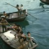 Young Chinese children on fishing boats