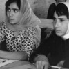 Workers during a class. Literacy pilot project of the Iranian government. A lit