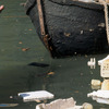 Venitian canal and small boat, pollution