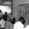 Men in an arithmetic class. Functional literacy class of the training program o