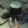Traditional cooking, rice and fish, cooking pot