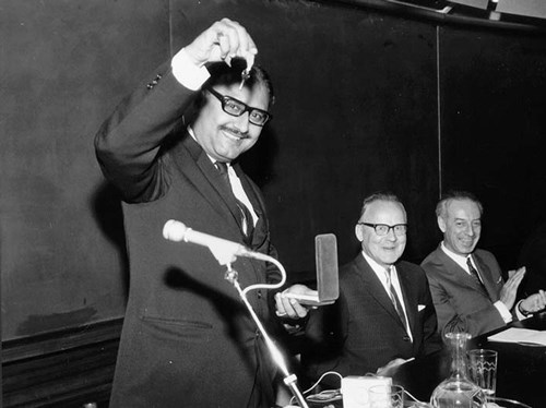 June 1968: ICTP founder and Nobel Laureate Abdus Salam holds the key to the newly opened ICTP main building, which was inaugurated during the International Symposium on Contemporary Physics