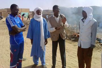 National UN Volunteer Hassane Abdoulsalamou with youth engaged in the project.