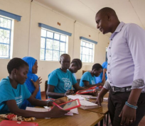 George teaches in a double-shift school in a refugee camp in Kenya to increase access to education image