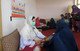A midwife performs an antenatal check up during a mobile health team visit in Nangarhar Province. © UNFPA Afghanistan