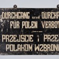 Camp board (crossing and driving through forbidden for Poles)