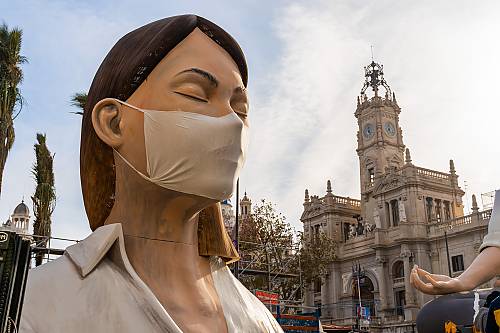 Spain, 12 March 2020. The Generalitat of Valencia postponed the celebration of Las Fallas Festival 2020 traditionally celebrated in March over coronavirus prevention. Woman Sculpture with closed eyes and with medical mask on it.