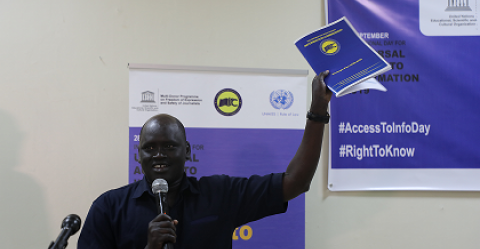 Hon. Nicodemus Ajaik, South Sudan Information Commissioner launches the 3-year Access to Information Strategic Plan during the Access to Information Day event in Juba ©UNESCO Juba Office