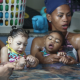 Parents and babies in a pool
