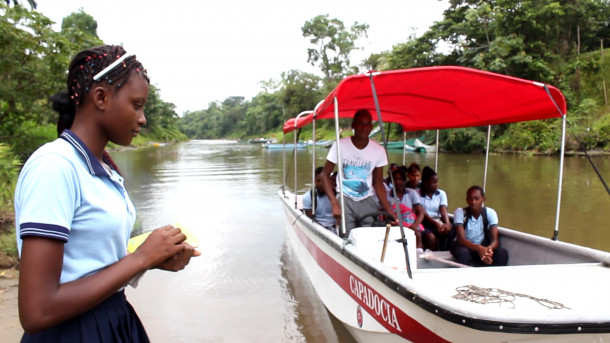 In the town of El Charco, where Afro-Colombian and native people reside, the students can go to school safely and without getting wet thanks to the boats provided by TİKA. El Charco, Colombia.