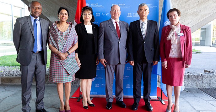 H.S.H. Prince Albert II of Monaco, Kathryn Waler, IUGG President, and guests are greeted by Xing Qu, Deputy Director-General of UNESCO, and Shamila Nair-Bedouelle, UNESCO Assistant Director-General for the Natural Sciences.